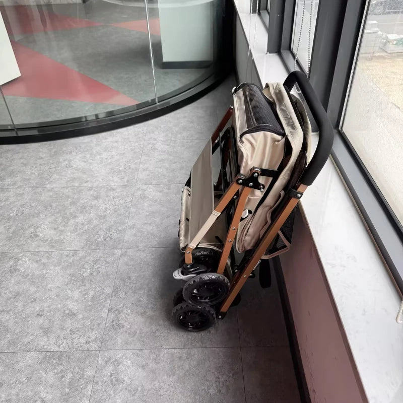 Lightweight Pet Stroller Featuring Quick Fold And Four Ventilated Wheels